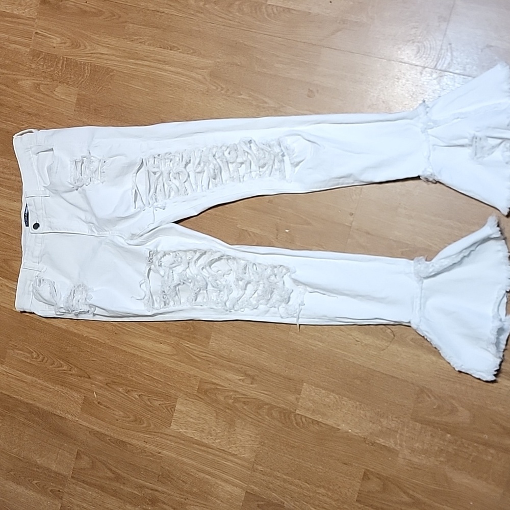 Fashion Nova stacked distressed white jeans